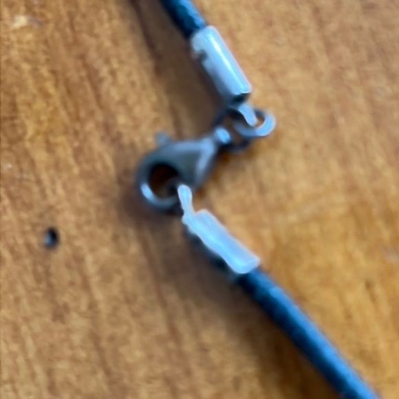 Sterling silver star pendent on black cord necklace. - Picture 5 of 5